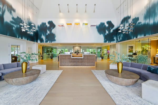 Bright lobby area with modern decor and seating
