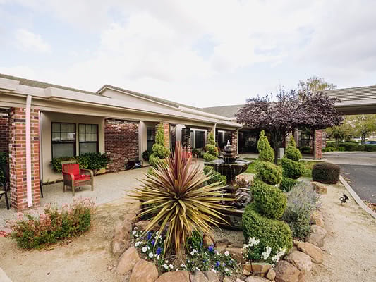 Beautiful outdoor space with gardens and fountain