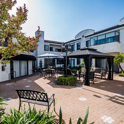 Outdoor courtyard with seating and landscaping