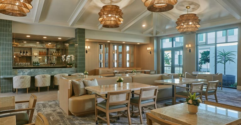 Bright dining area with modern decor and seating