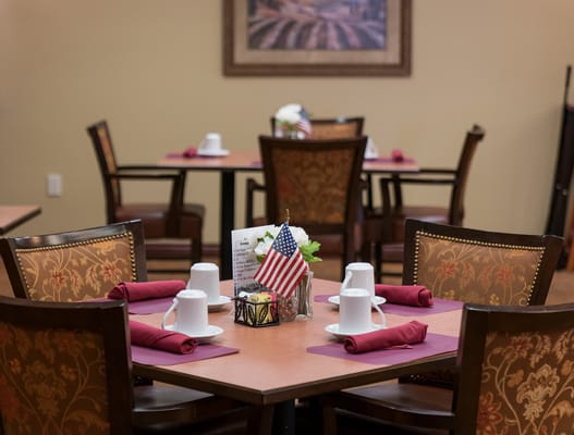Dining room set up with table decor and American flag