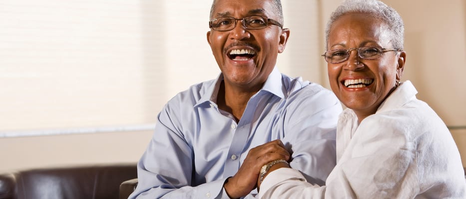Two smiling residents enjoying their time together