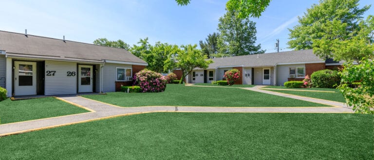 Well-maintained outdoor area with paths and greenery