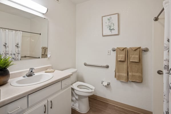 Clean bathroom with modern fixtures and decor