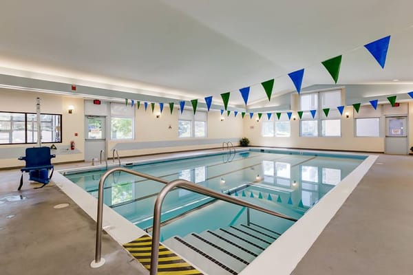 Indoor swimming pool with colorful flags