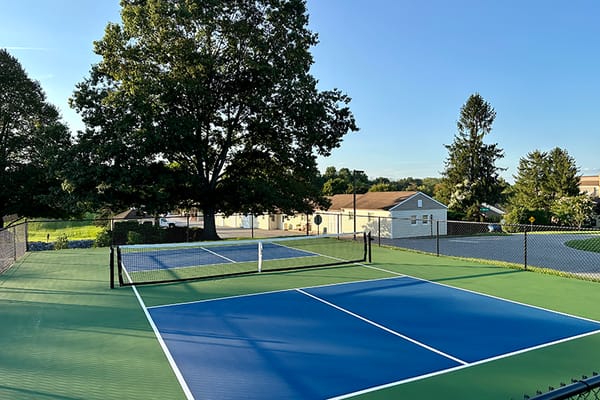 Tennis courts in an outdoor area