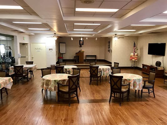 Interior view of a common area with tables and chairs
