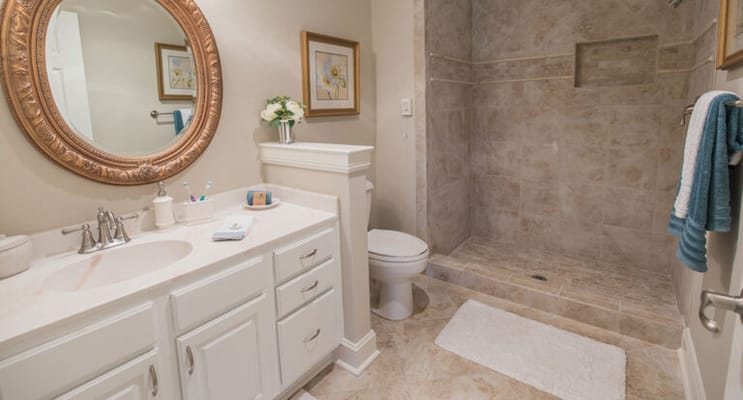 Bright and modern bathroom in a resident's room