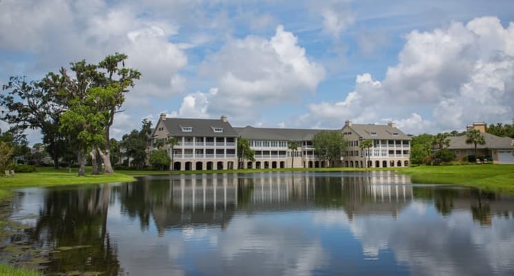 Exterior view of Marsh's Edge near a lake