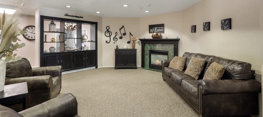 Cozy common area with comfortable seating and music decor