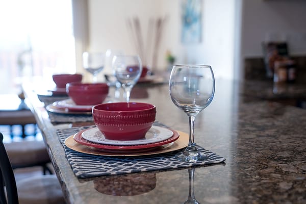 Table set with dinnerware in a dining room