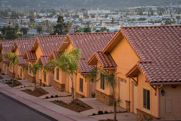 Row of residential buildings with tiled roofs