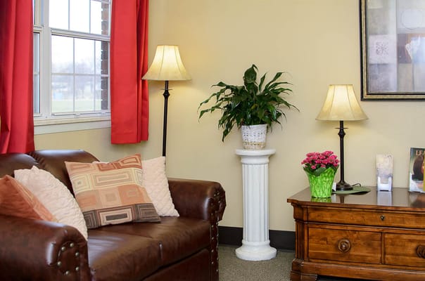 Cozy interior area with a couch and lamps