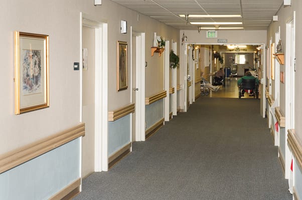 Corridor of the assisted living facility with residents