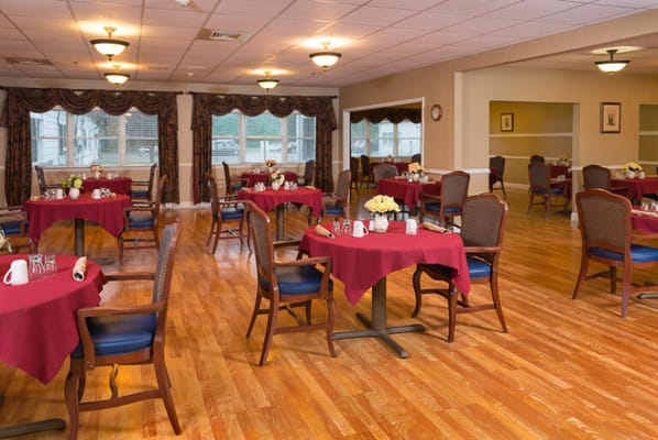 Bright dining area with tables set for meals