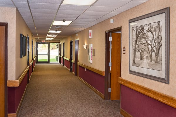 Bright hallway leading to an exit door