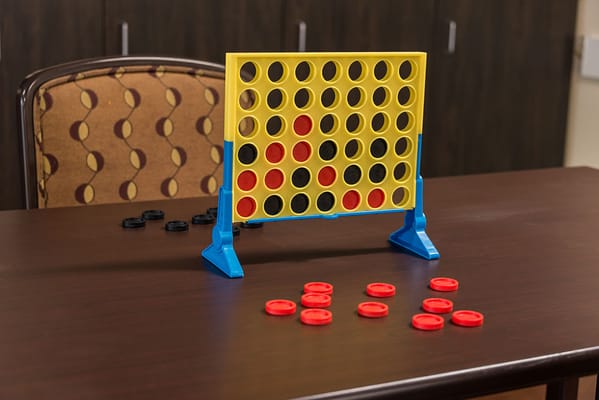 A game of Connect Four set up on a table