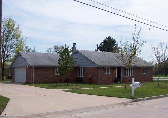 Exterior view of a single-story brick building