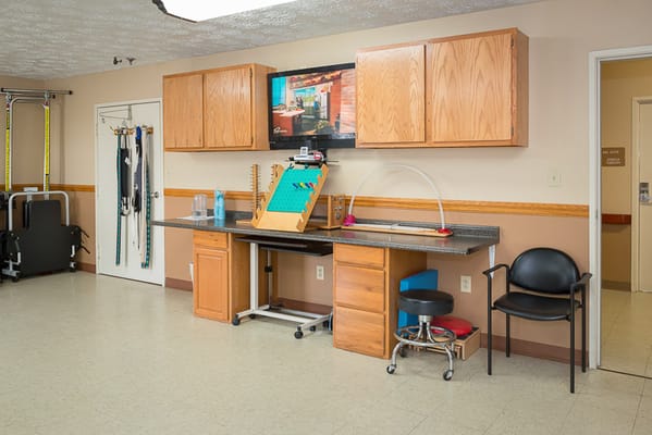 Interior view of a therapy room with equipment