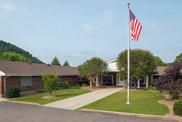 Exterior view of the facility with American flag