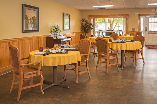 Dining area with tables set for meals