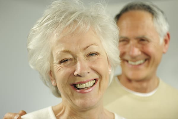 Happy seniors smiling for the camera