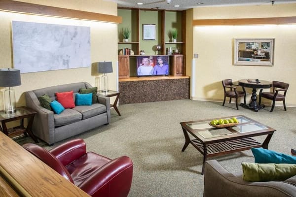 Bright common area with comfortable seating and decor