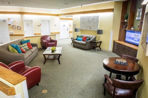 Common area with seating in a bright lounge