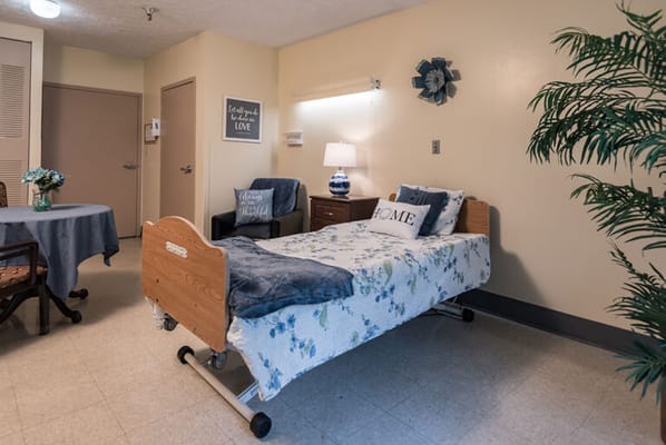 Cozy private bedroom in a senior living facility
