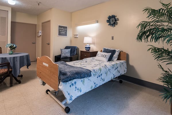 Cozy private bedroom in a senior living facility