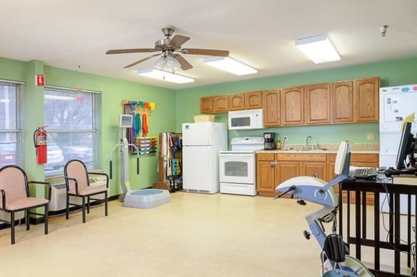 Bright interior of a common area with exercise equipment