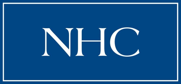 NHC facility logo in white on blue background