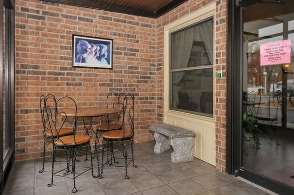 Interior space with a table and chairs near a window