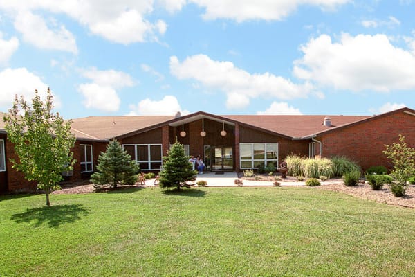 Exterior of Life Care Center of Seneca with landscaped areas