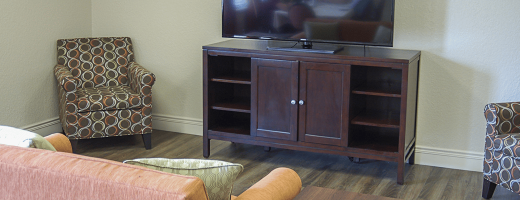 Cozy common area with comfortable seating and TV