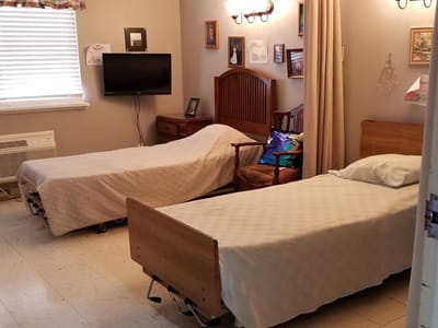 Interior view of a shared resident room with two beds