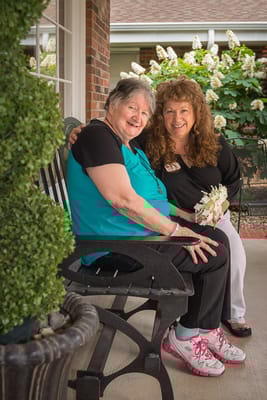 Residents and staff enjoying time together in a common area