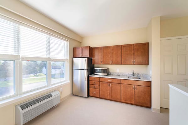 Interior view of a kitchenette in a resident unit