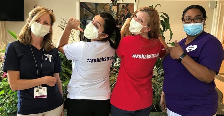 Staff members showcasing teamwork and positivity