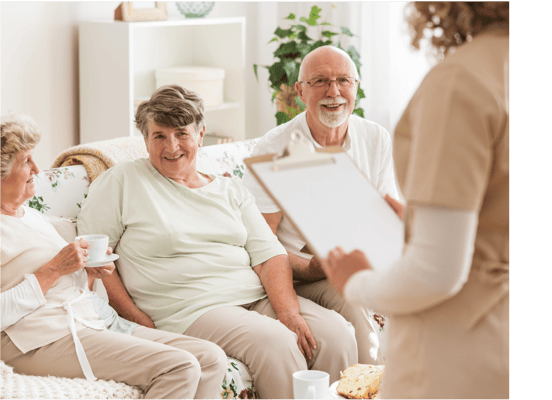 Residents enjoying tea in a cozy common area