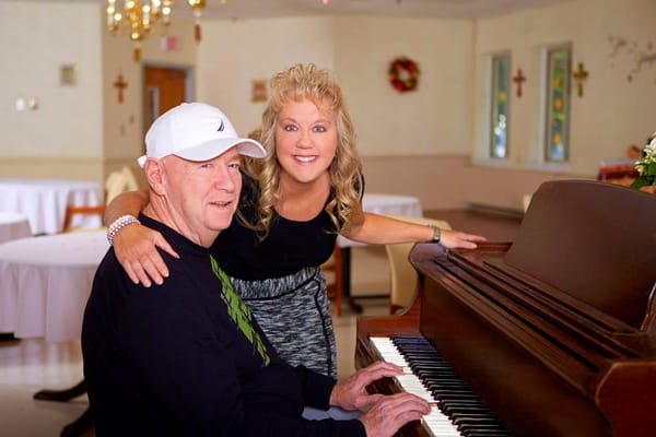 Residents enjoying music in a lively interior space