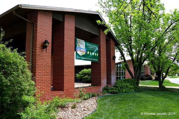 Exterior view of the Parkside Homes facility with landscaping