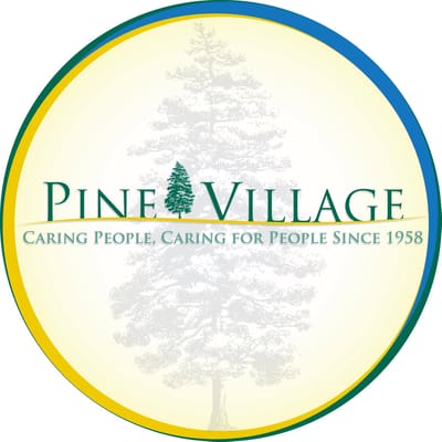 Logo of Pine Village with tree emblem