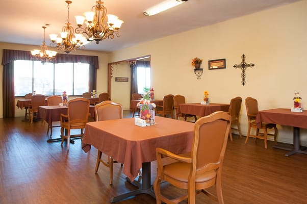 Dining area with tables and chairs set up