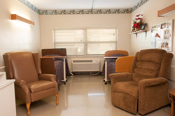 Cozy interior of a resident room with two chairs