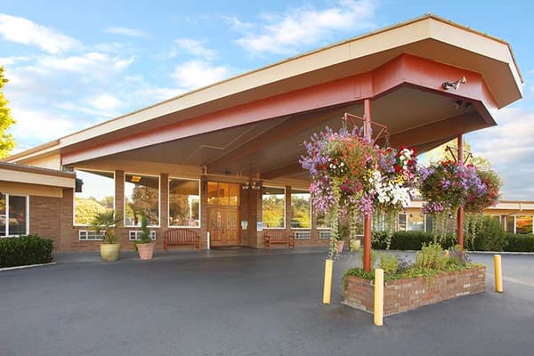 Entrance of Life Care Center of McMinnville with flowers