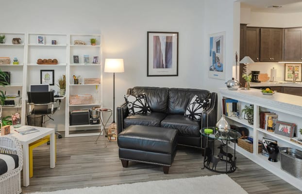 Cozy interior lounge area with furniture and decor