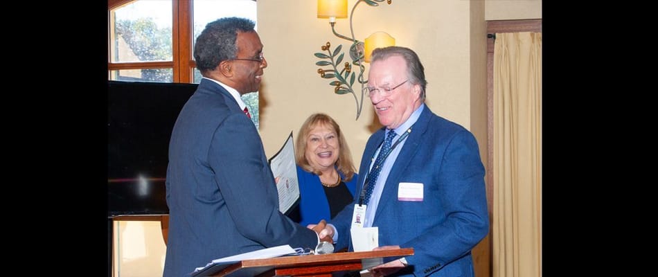 Staff members celebrating an award ceremony