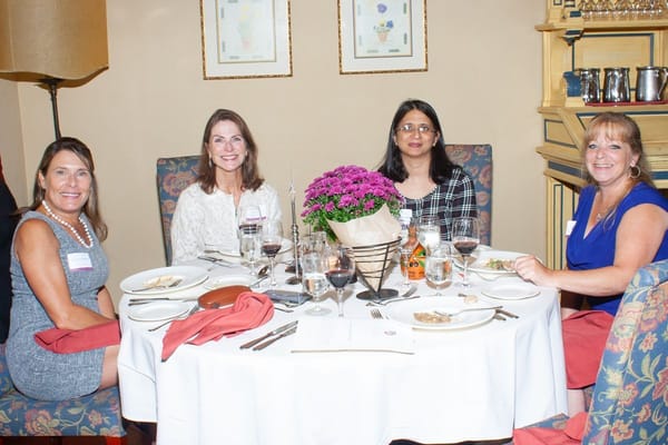 Residents enjoying a meal together in the dining area