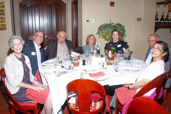 Group of residents enjoying a meal together